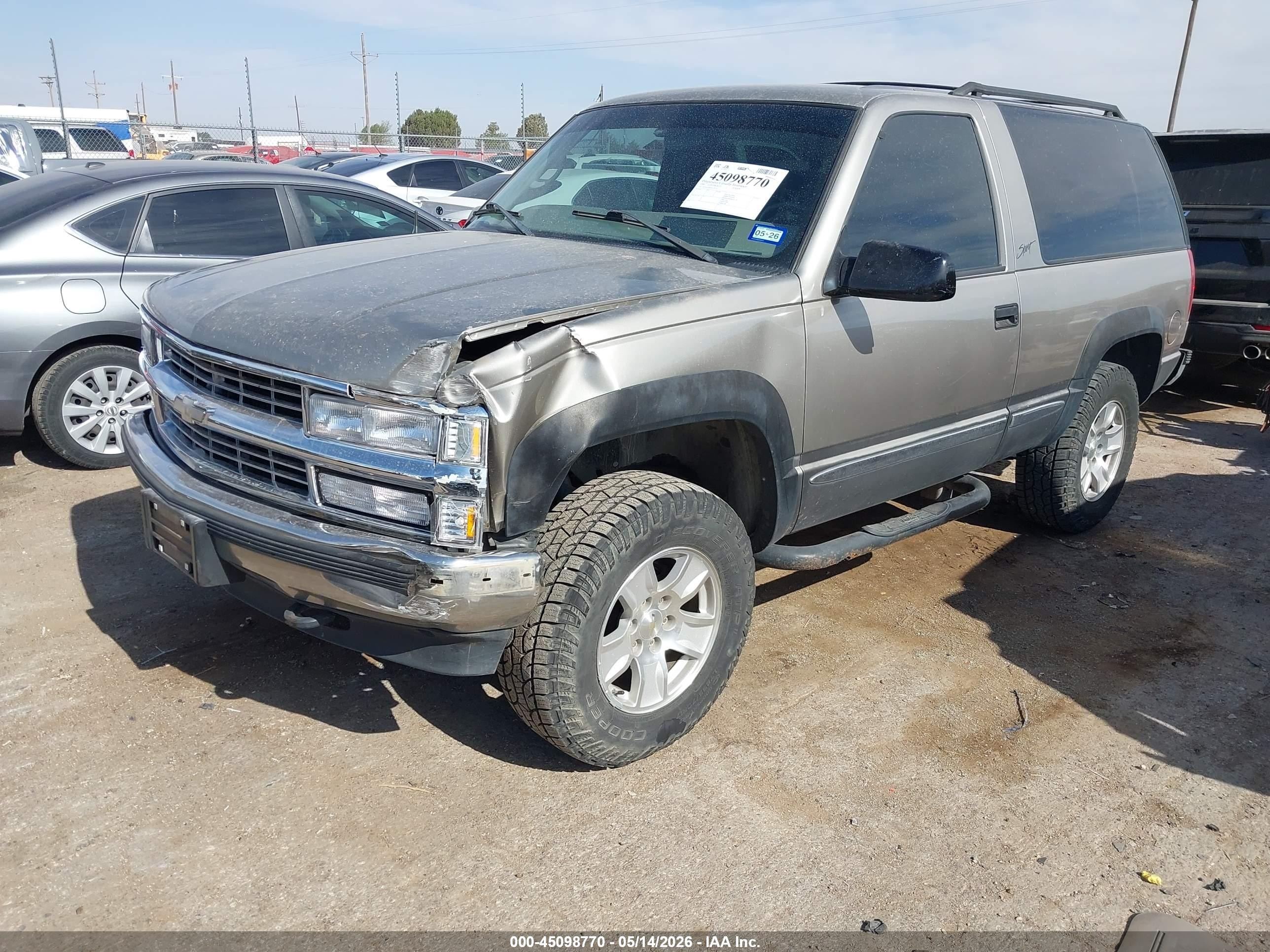 1999 Chevrolet Tahoe   Pewter vin: 3GNEK18R8XG207211