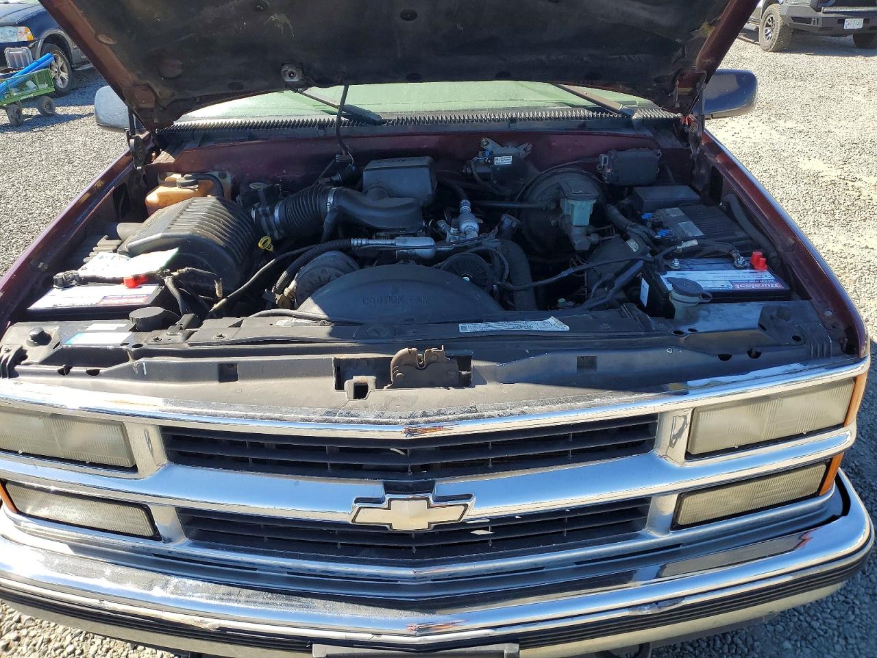 1999 Chevrolet Suburban K1500 Темно-бордовый vin: 3GNFK16R9XG194038