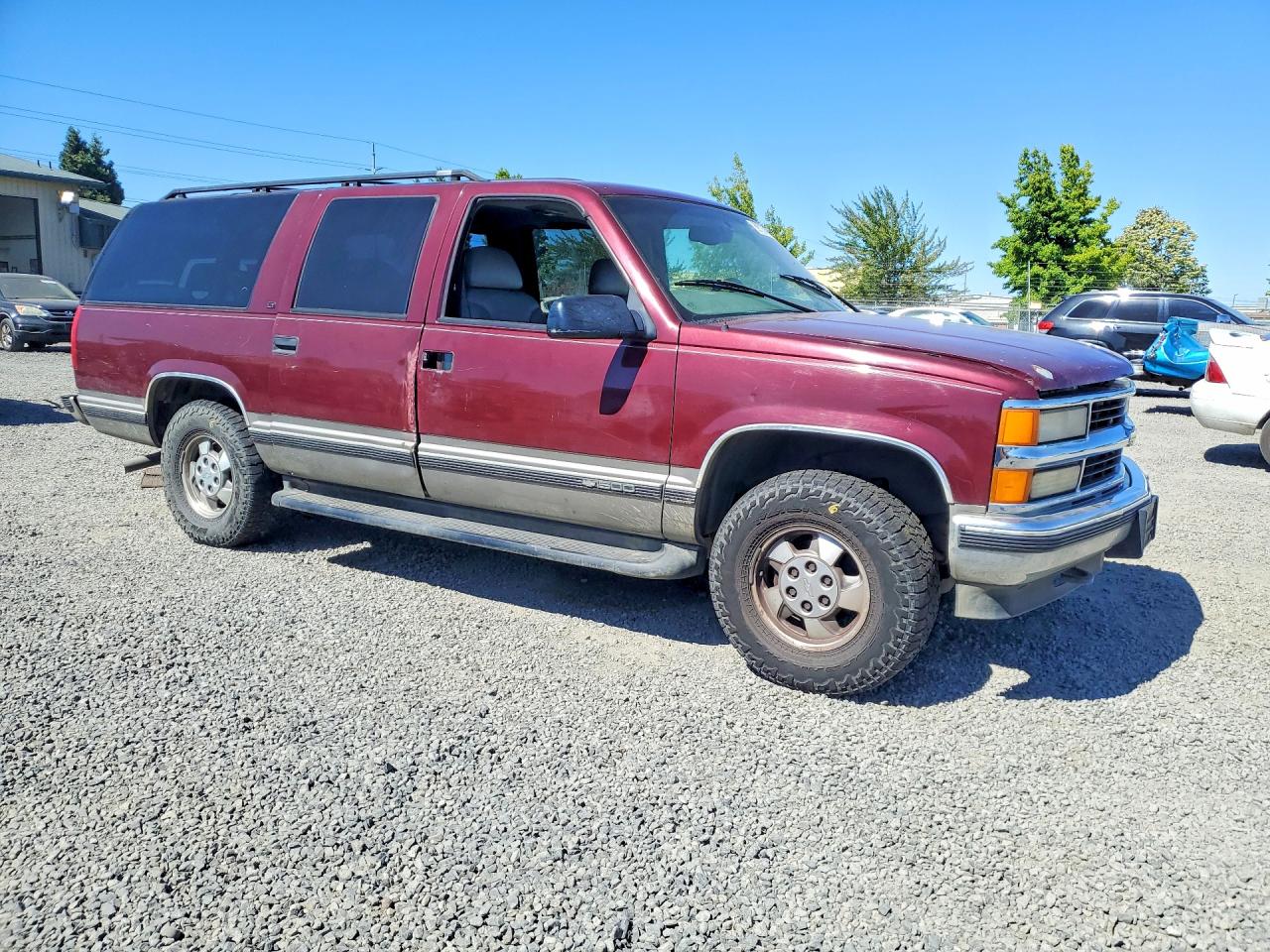 1999 Chevrolet Suburban K1500 Темно-бордовый vin: 3GNFK16R9XG194038
