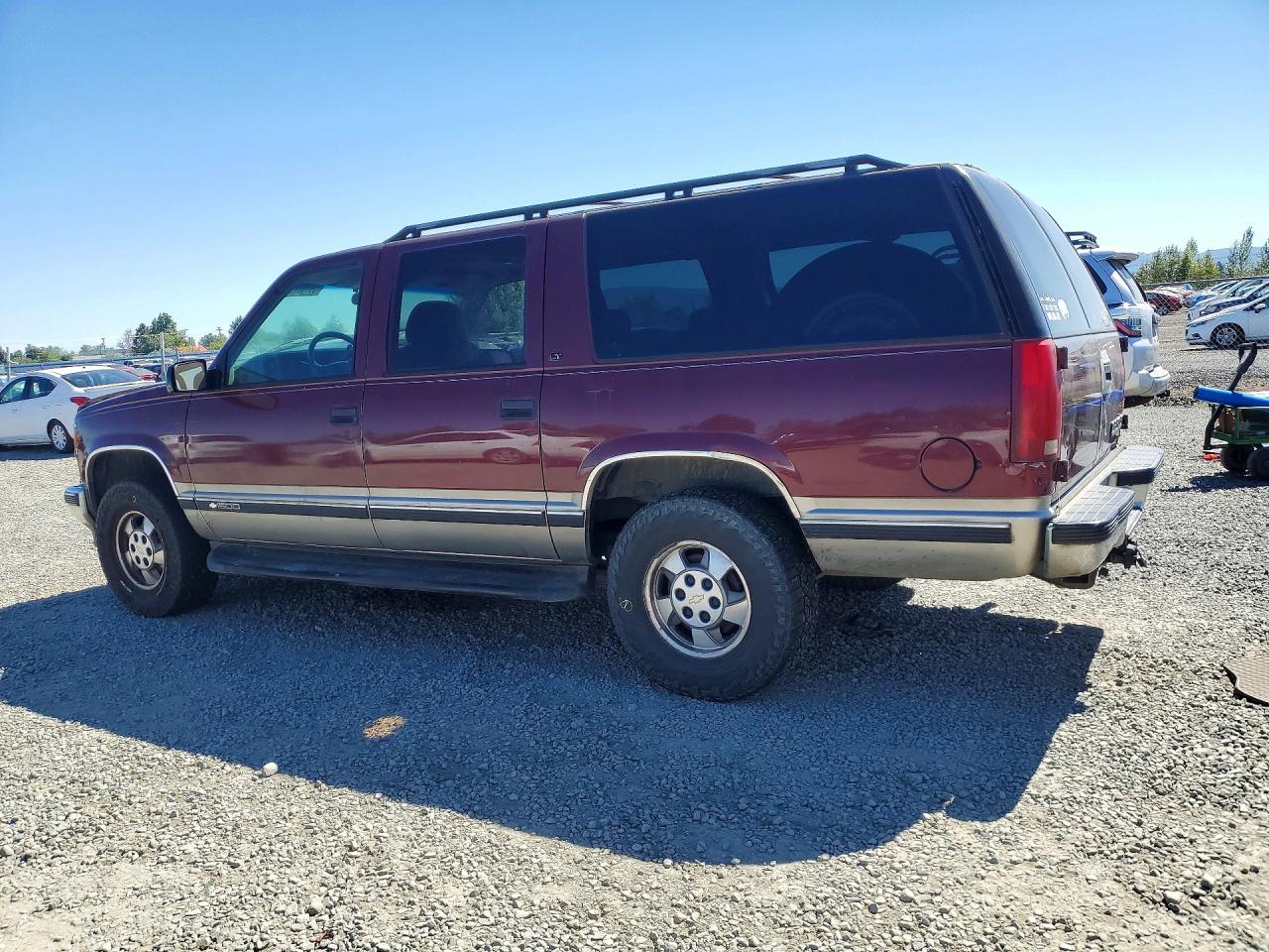 1999 Chevrolet Suburban K1500 Темно-бордовый vin: 3GNFK16R9XG194038