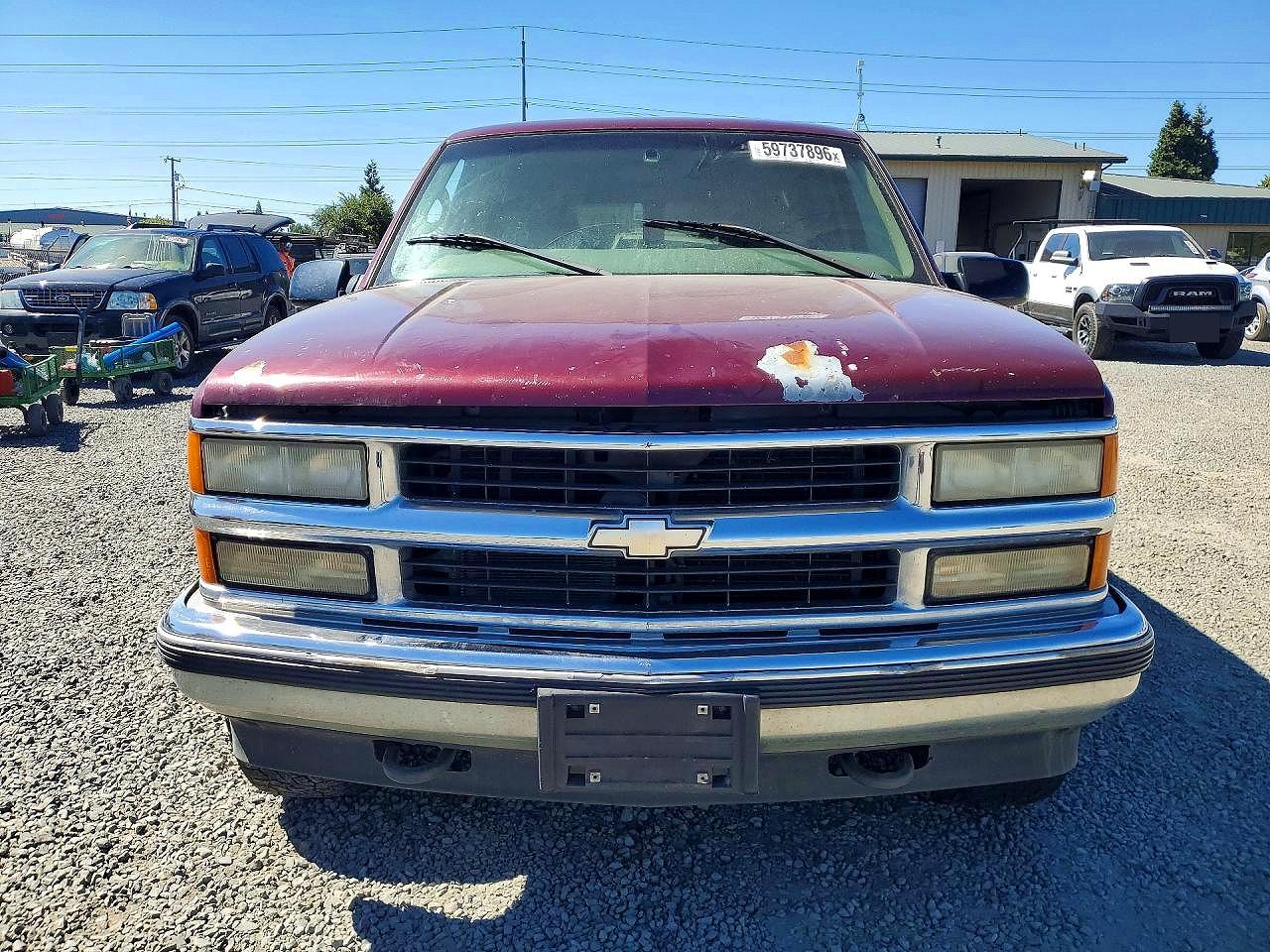 1999 Chevrolet Suburban K1500 Темно-бордовый vin: 3GNFK16R9XG194038