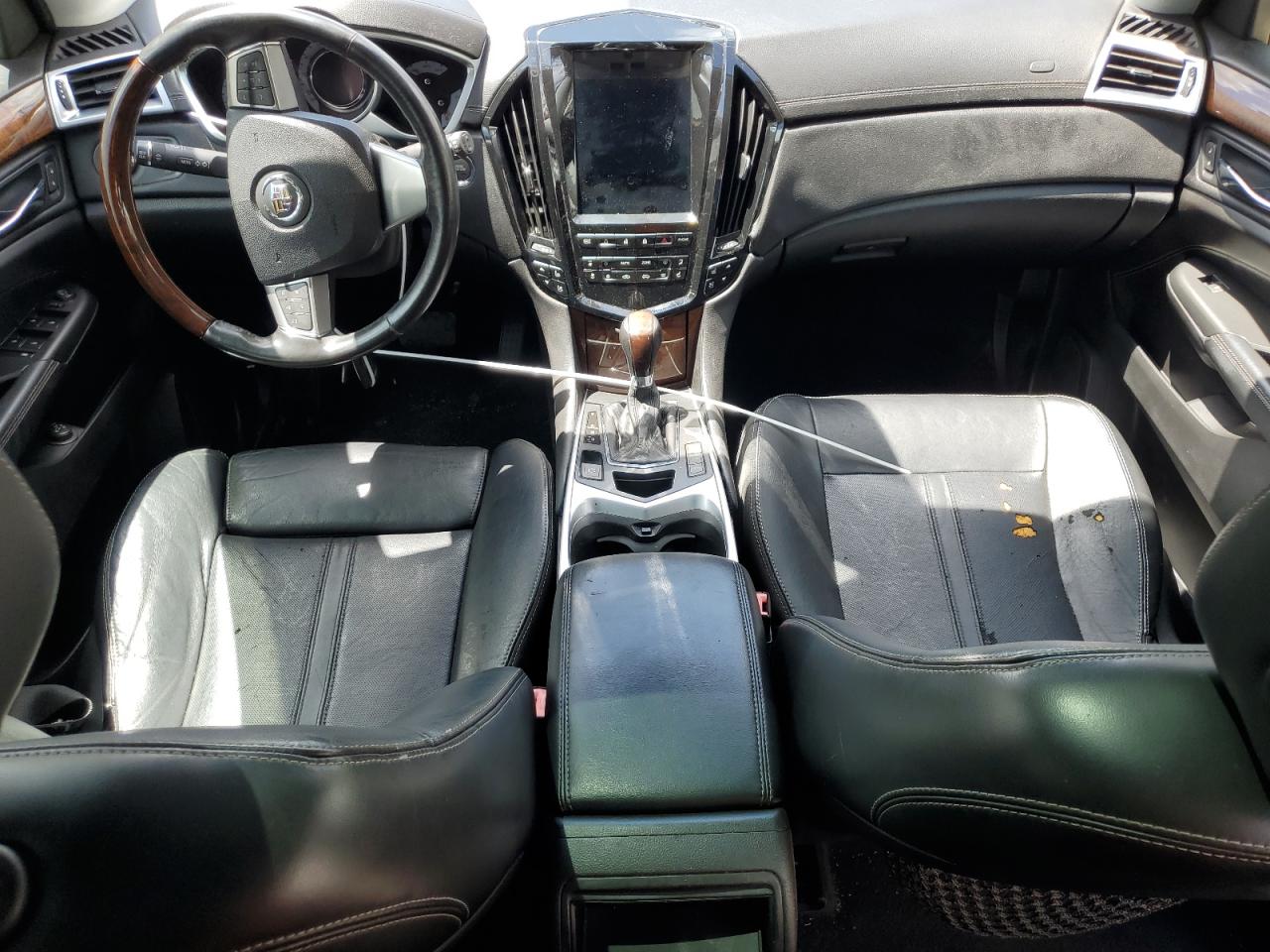 2012 Cadillac Srx Luxury Collection Black vin: 3GYFNAE30CS509288 Damage: Left Front Seat Cushion, Torn, 1 To 2 Inches
