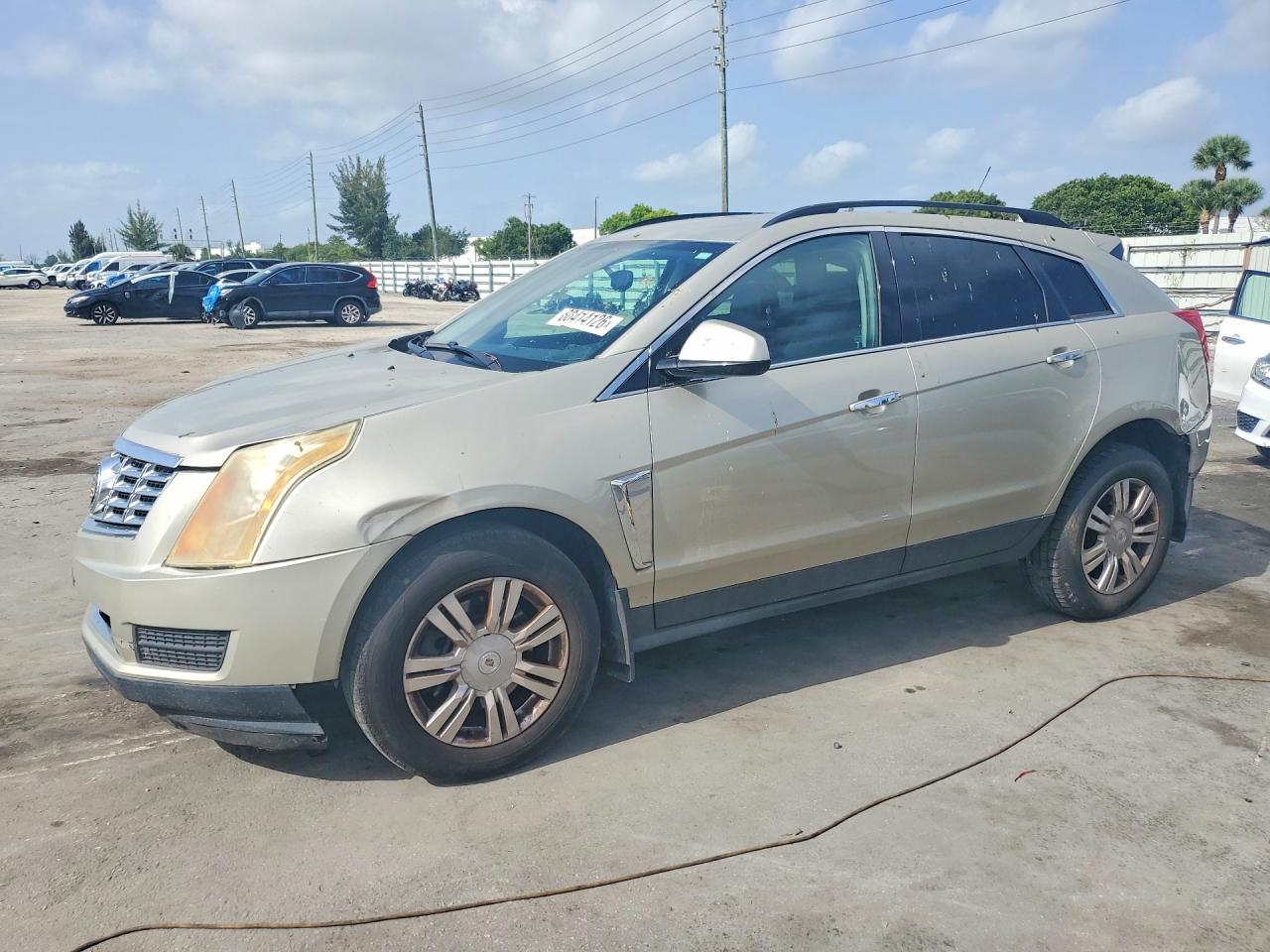 2015 Cadillac Srx Золотой vin: 3GYFNAE32FS524959