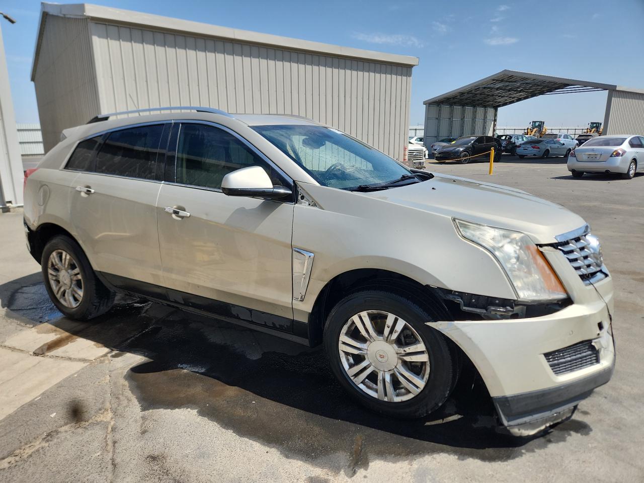 2015 Cadillac Srx Luxury Collection Tan vin: 3GYFNBE34FS584635 Damage: Front Bumper/Cover, Broken, Replacement Required