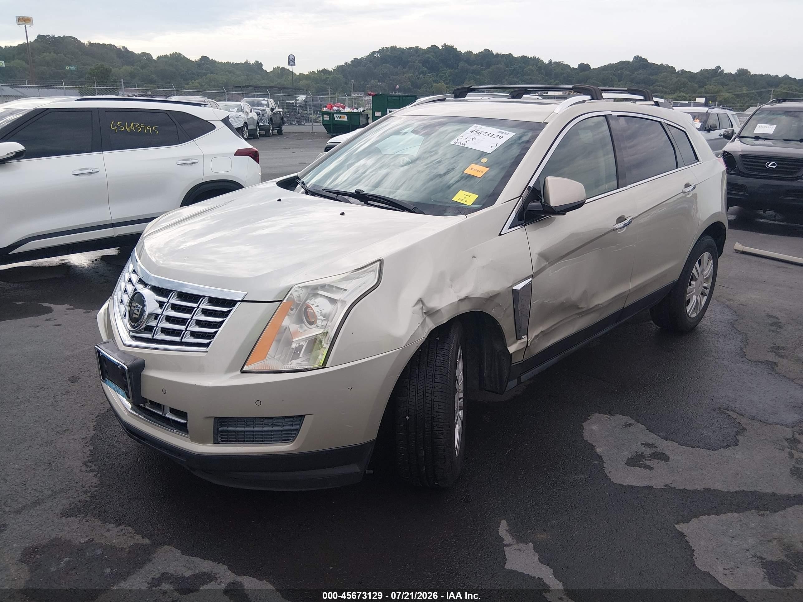 2015 Cadillac Srx Luxury Collection Золотой vin: 3GYFNBE3XFS525332
