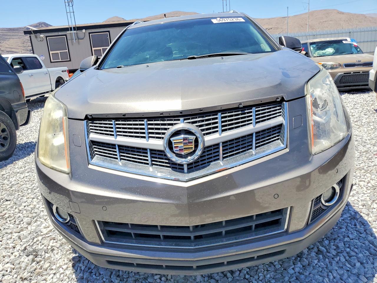 2011 Cadillac Srx Performance Collection Tan vin: 3GYFNBEY9BS649310