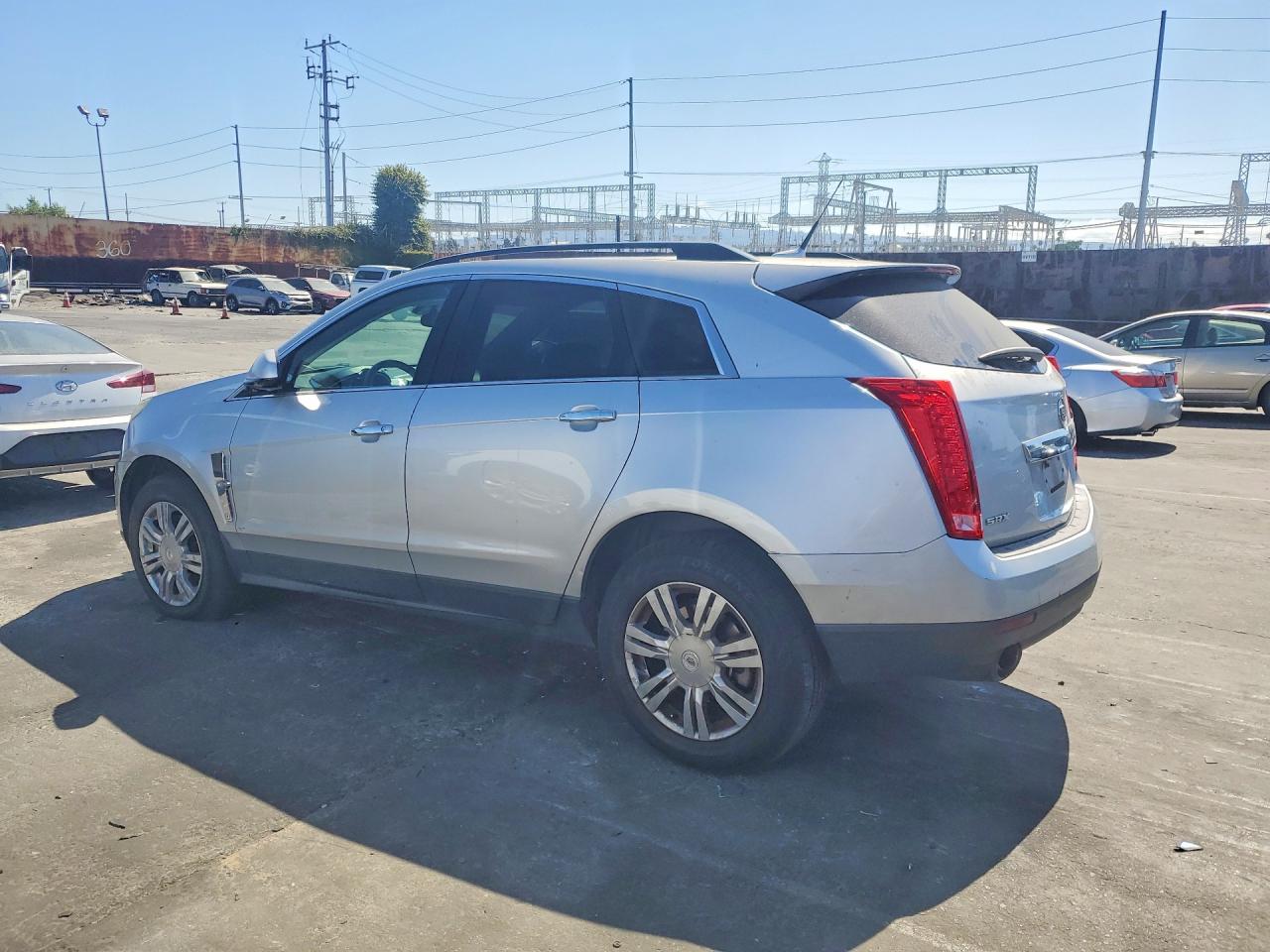 2012 Cadillac Srx Серебряный vin: 3GYFNGE3XCS645771