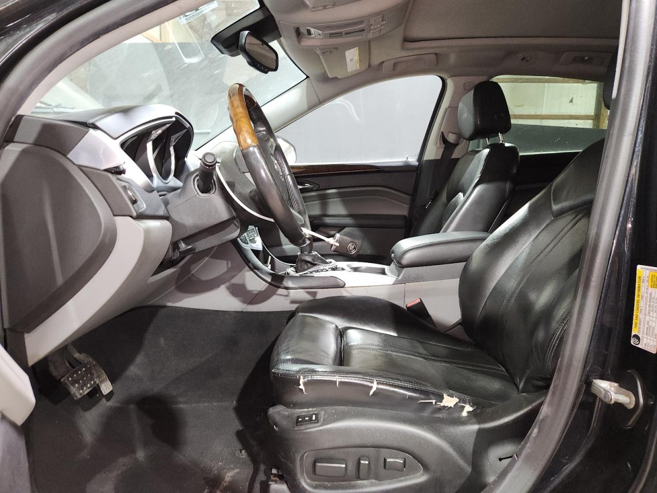 2011 Cadillac Srx Premium Collection Charcoal vin: 3GYFNKE62BS506732 Damage: Left Front Seat Cushion, Worn, Replacement Required