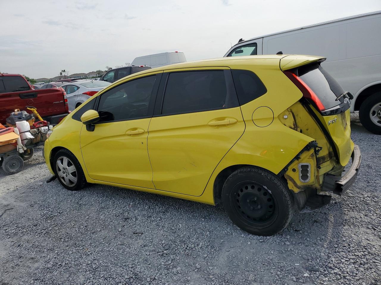 2015 Honda Fit Lx Yellow vin: 3HGGK5G50FM771332