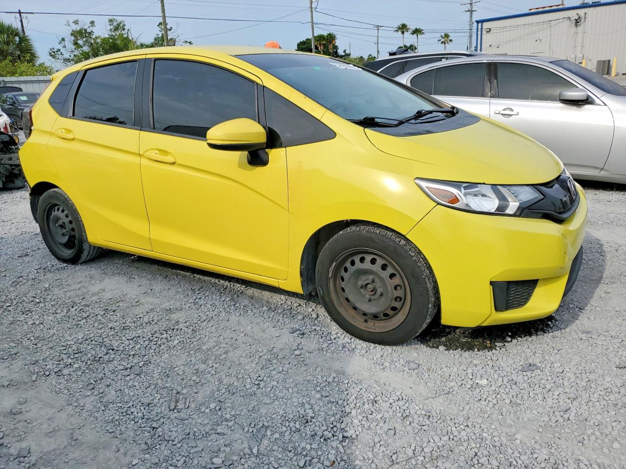 2015 Honda Fit Lx Yellow vin: 3HGGK5G50FM771332