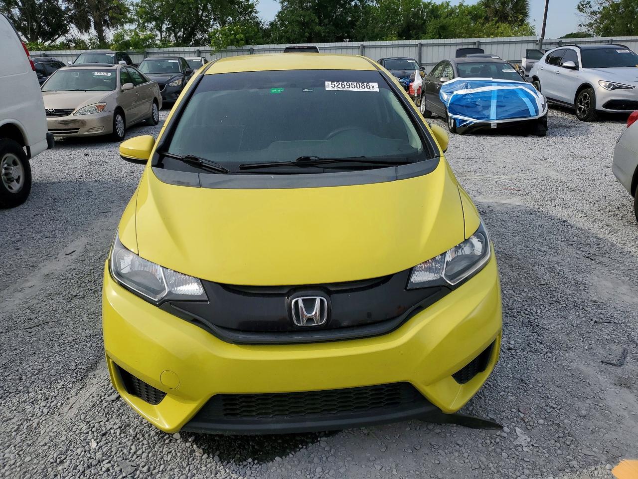 2015 Honda Fit Lx Yellow vin: 3HGGK5G50FM771332