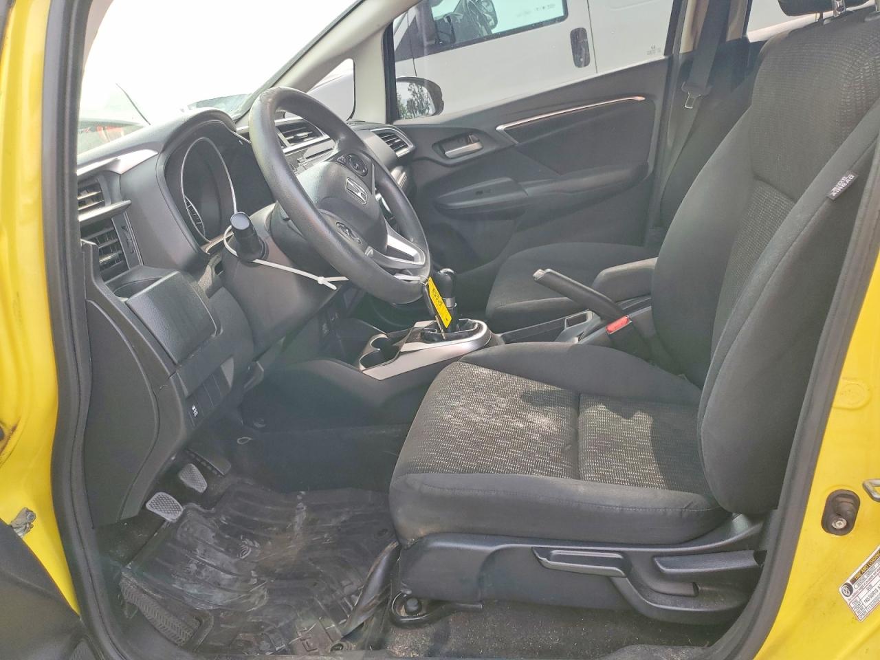 2015 Honda Fit Lx Yellow vin: 3HGGK5G50FM771332