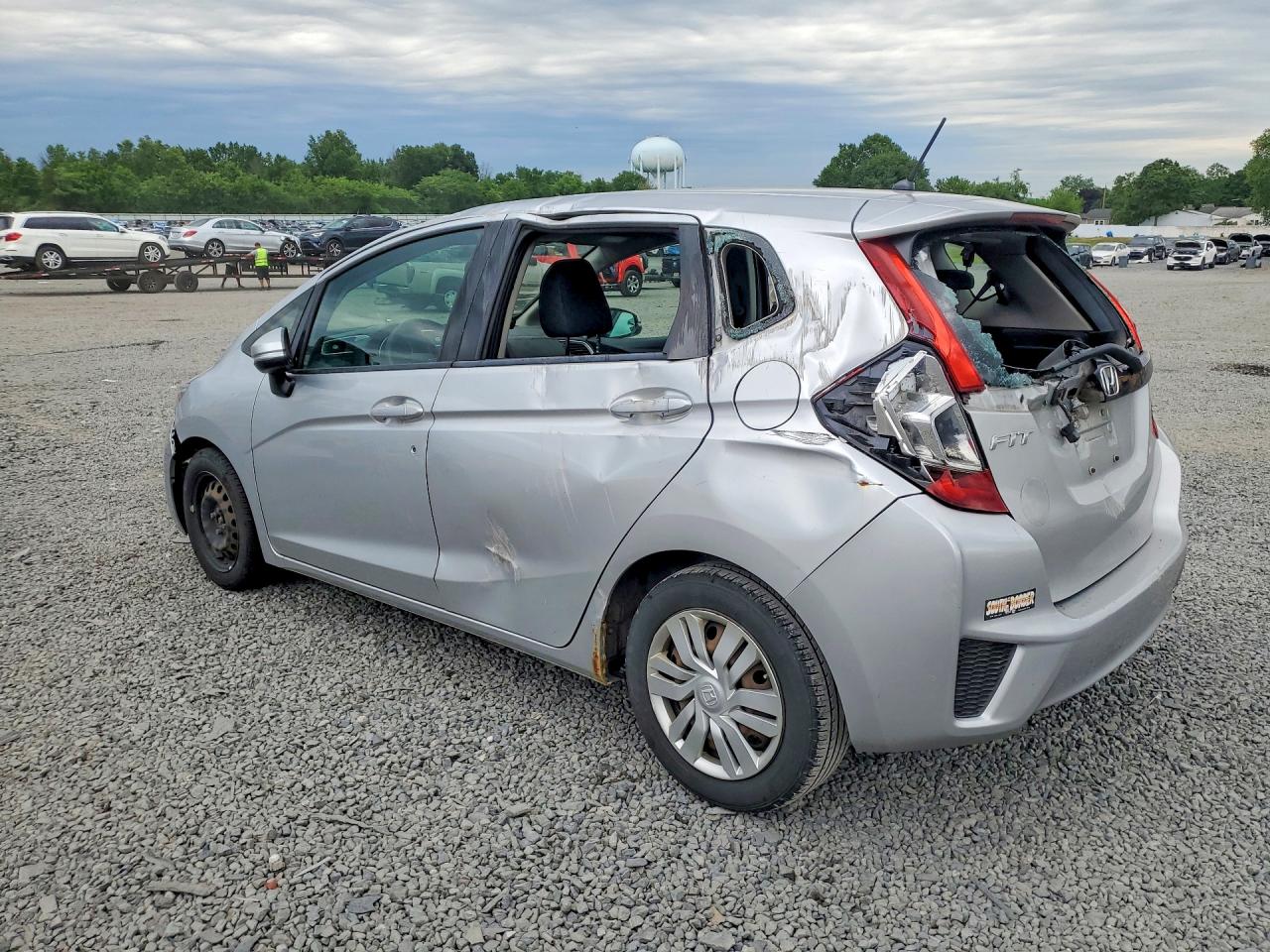 2015 Honda Fit Lx Серебряный vin: 3HGGK5G53FM753858