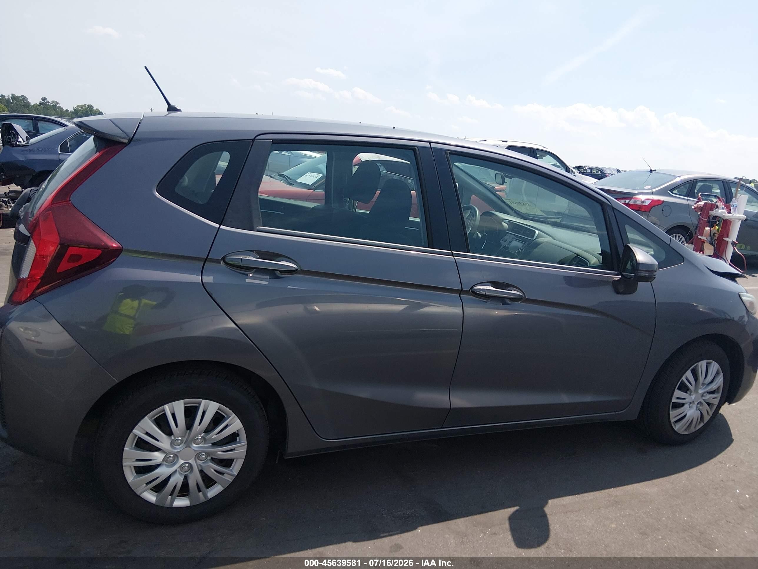 2015 Honda Fit Lx Серый vin: 3HGGK5G54FM724627