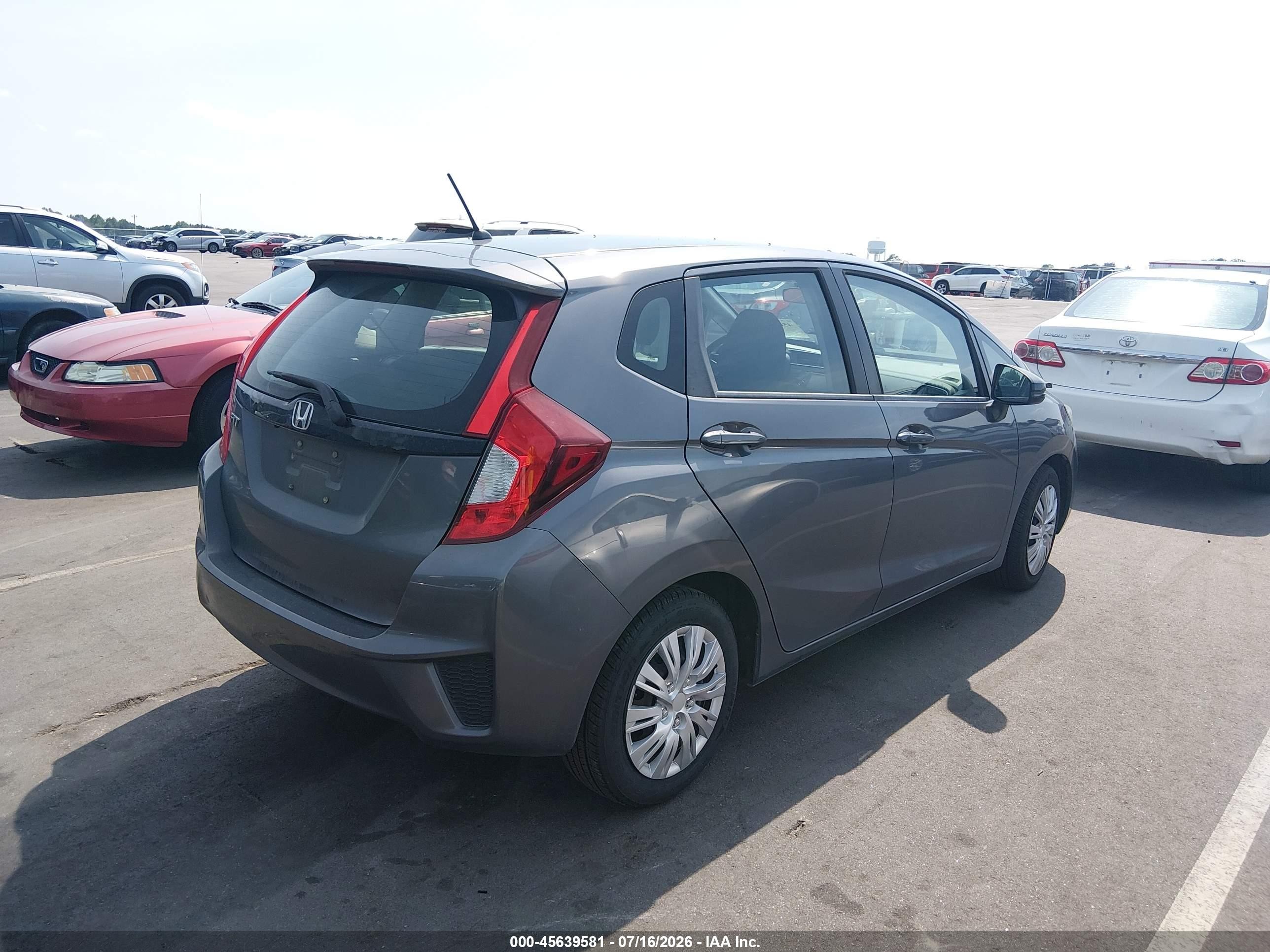 2015 Honda Fit Lx Серый vin: 3HGGK5G54FM724627