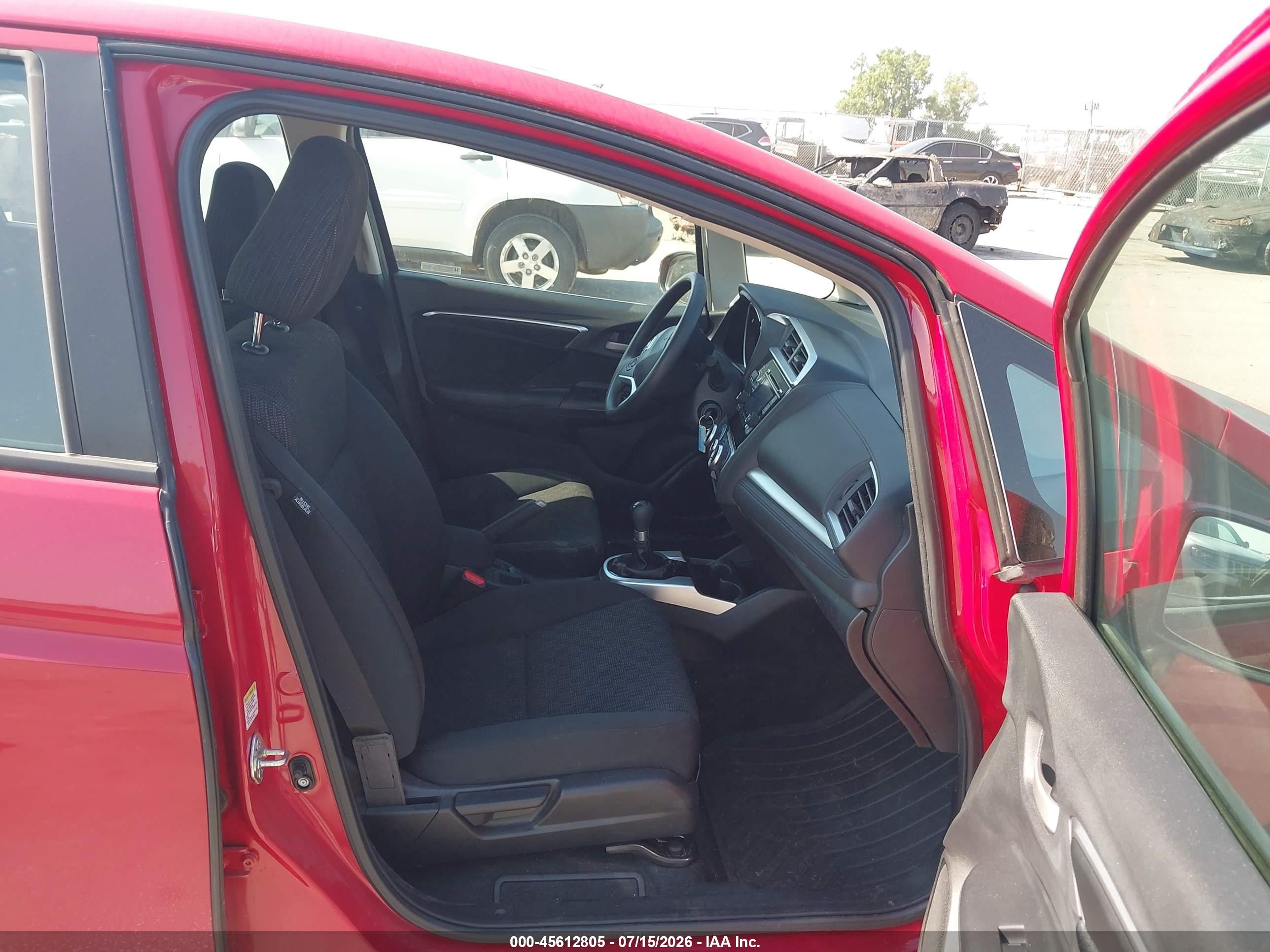 2015 Honda Fit Lx Red vin: 3HGGK5G55FM748189