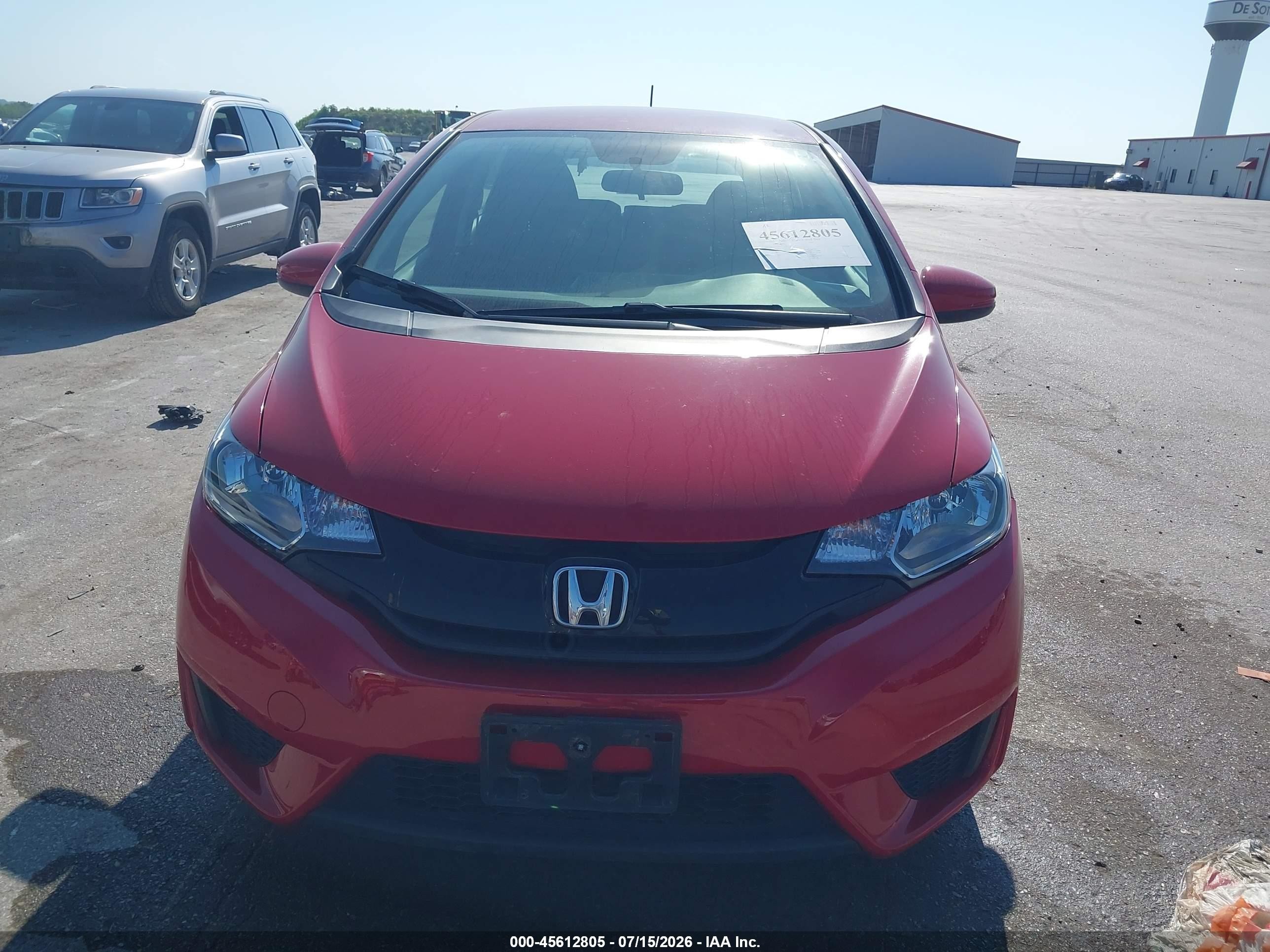 2015 Honda Fit Lx Red vin: 3HGGK5G55FM748189