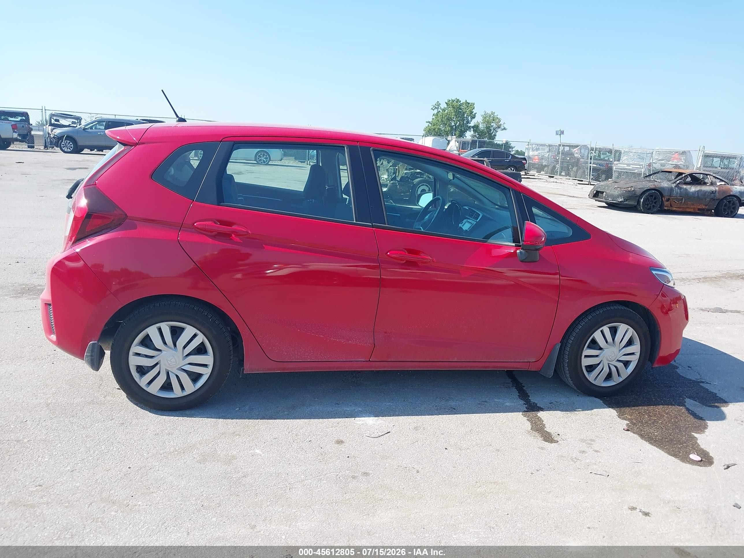 2015 Honda Fit Lx Red vin: 3HGGK5G55FM748189
