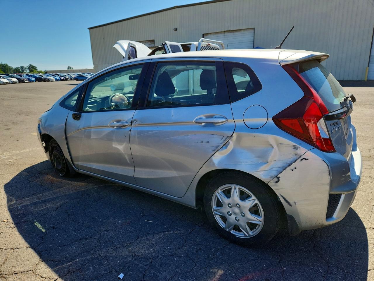 2015 Honda Fit Lx Silver vin: 3HGGK5G57FM753829