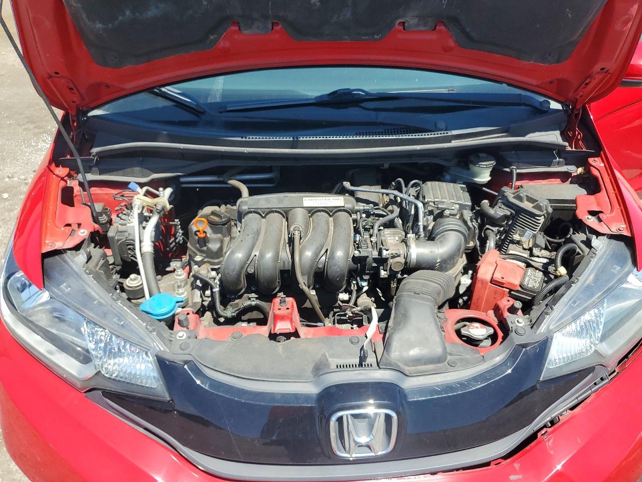 2015 Honda Fit Lx Red vin: 3HGGK5G58FM748199