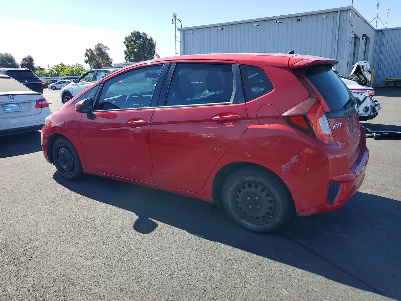 2015 Honda Fit Lx Red vin: 3HGGK5G59FM767683