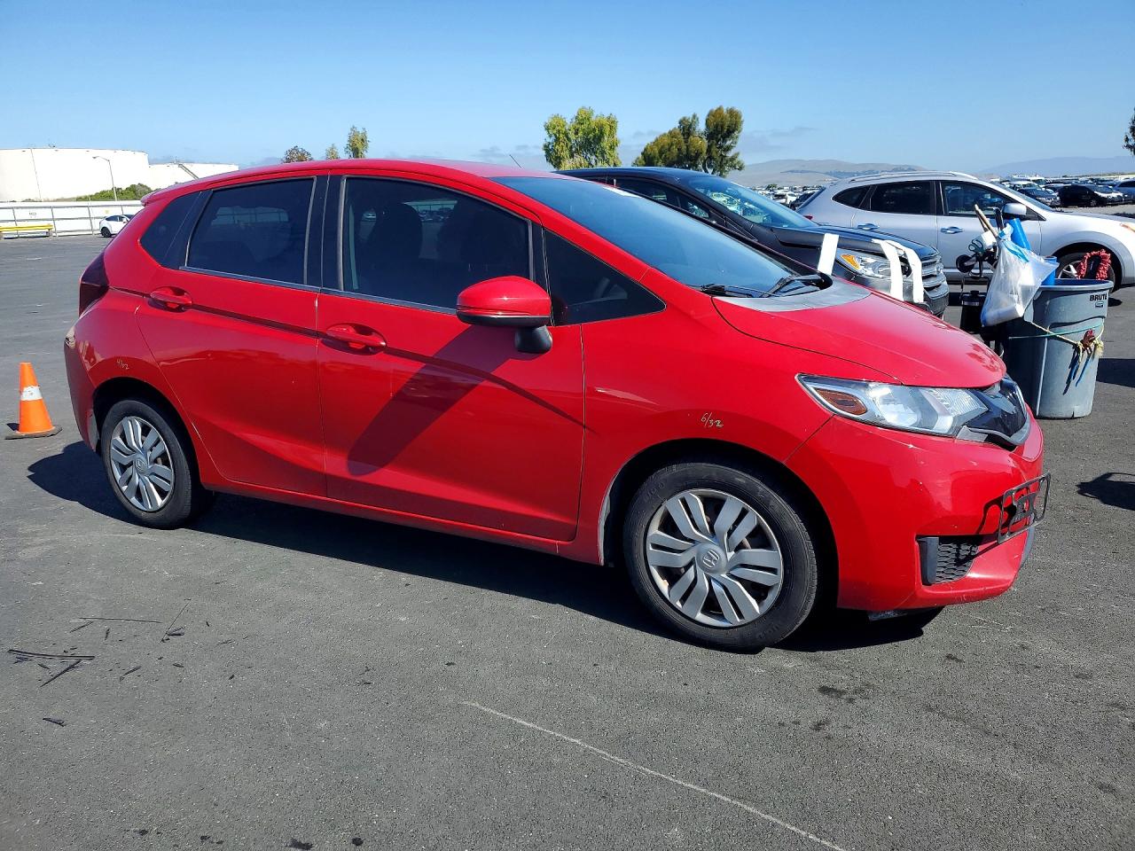 2015 Honda Fit Lx Red vin: 3HGGK5G59FM767683