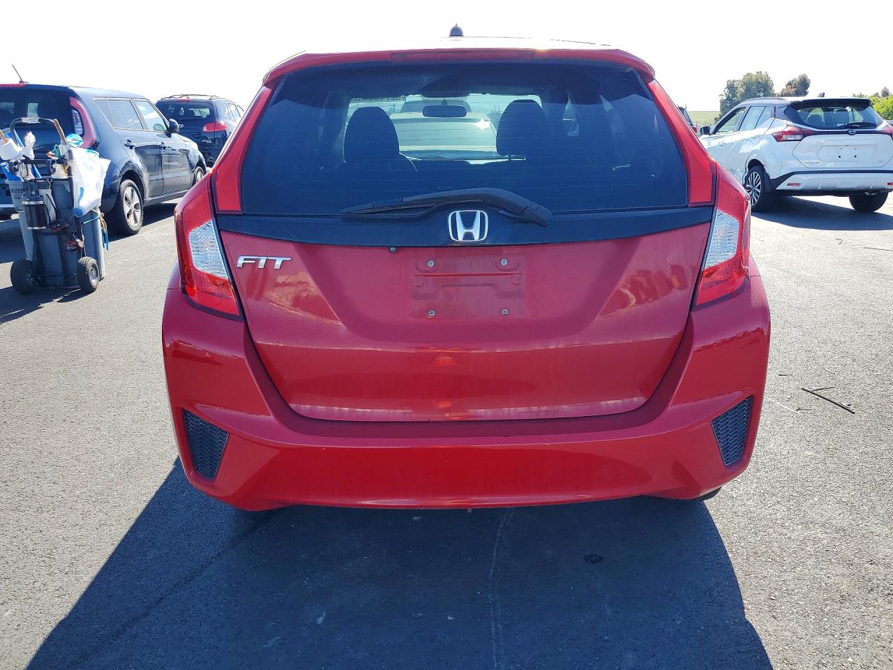 2015 Honda Fit Lx Red vin: 3HGGK5G59FM767683