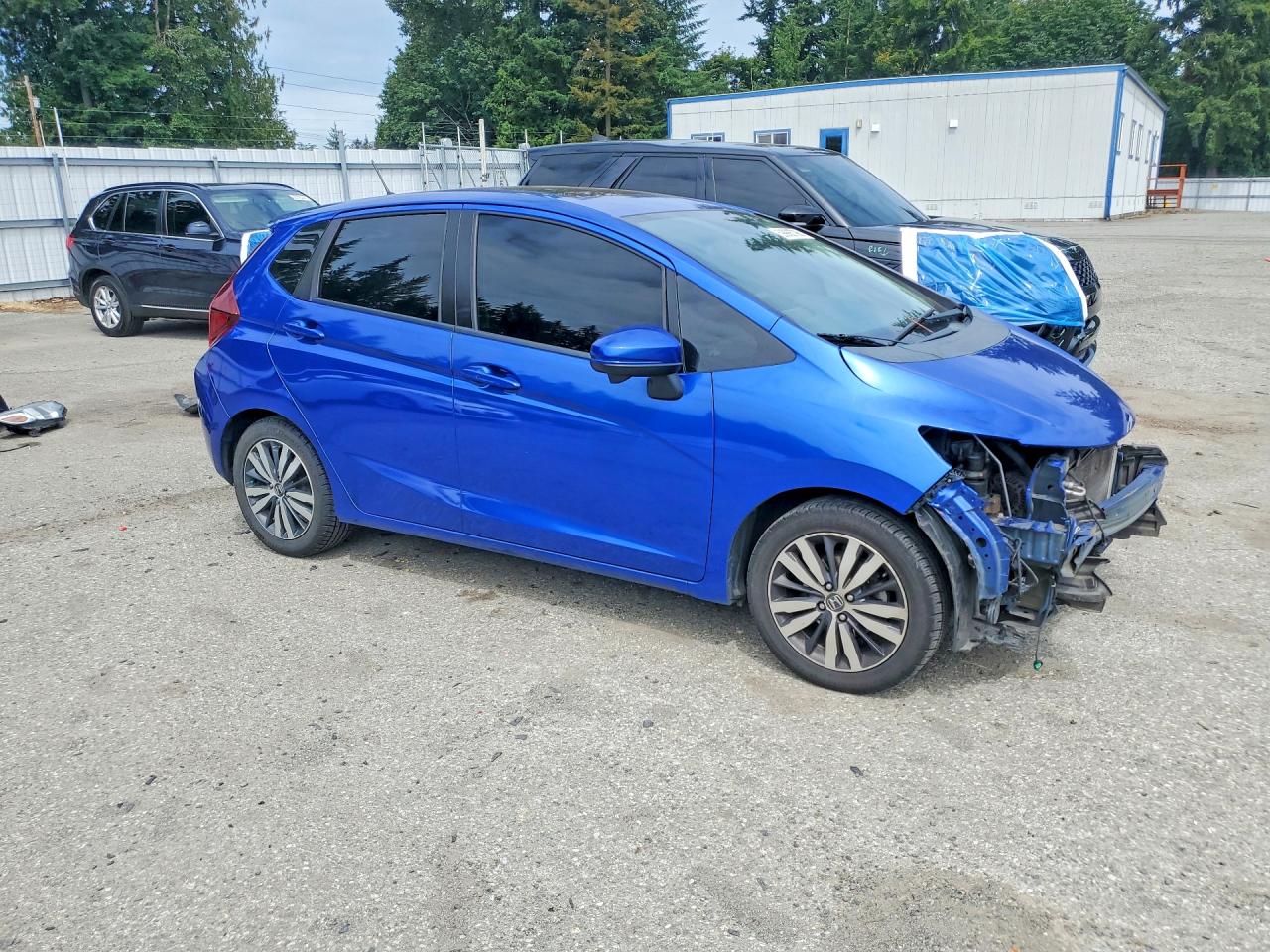 2015 Honda Fit Ex Blue vin: 3HGGK5G84FM731166