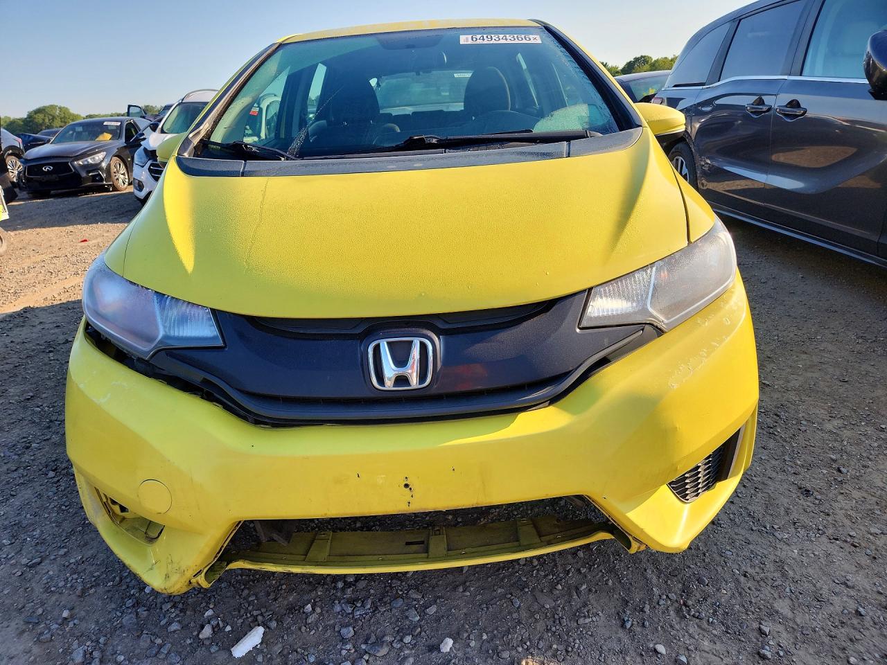 2015 Honda Fit Lx Yellow vin: 3HGGK5H51FM717598