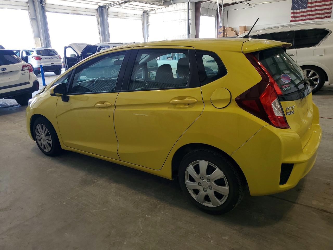 2015 Honda Fit Lx Yellow vin: 3HGGK5H51FM775386