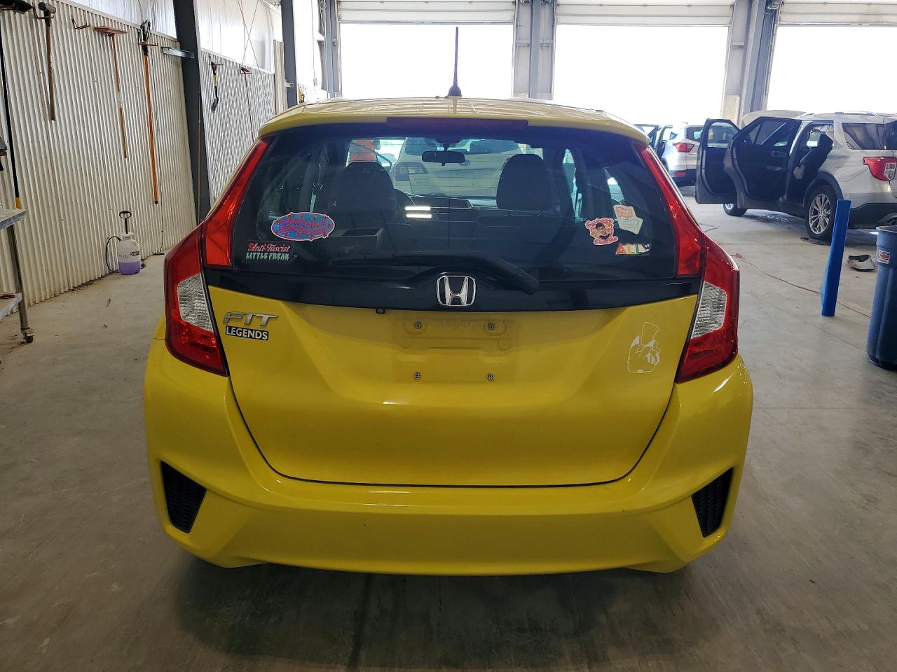 2015 Honda Fit Lx Yellow vin: 3HGGK5H51FM775386