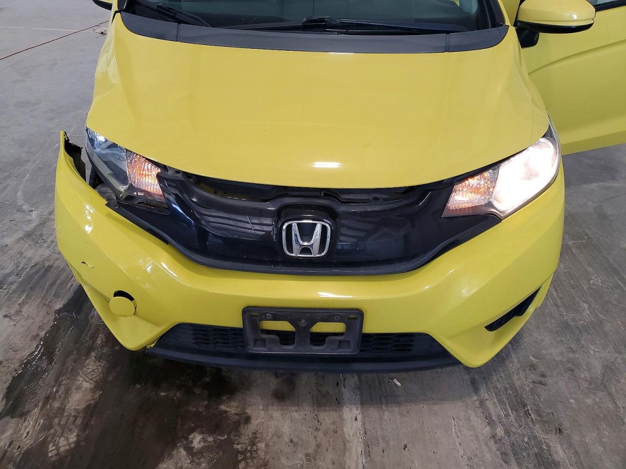 2015 Honda Fit Lx Yellow vin: 3HGGK5H51FM775386