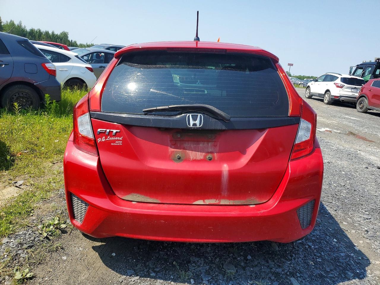 2015 Honda Fit Lx Red vin: 3HGGK5H52FM102123