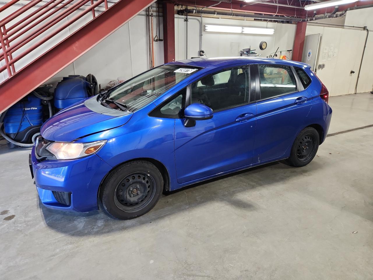 2015 Honda Fit Lx Blue vin: 3HGGK5H55FM786696 Damage: Left Front Fender, Dent(S) W/ Paint Dmg, 3 To 4 Inches