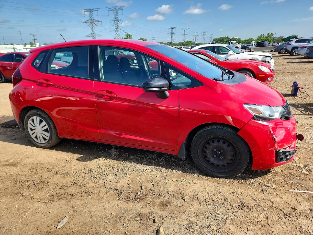 2015 Honda Fit Lx Red vin: 3HGGK5H57FM740934