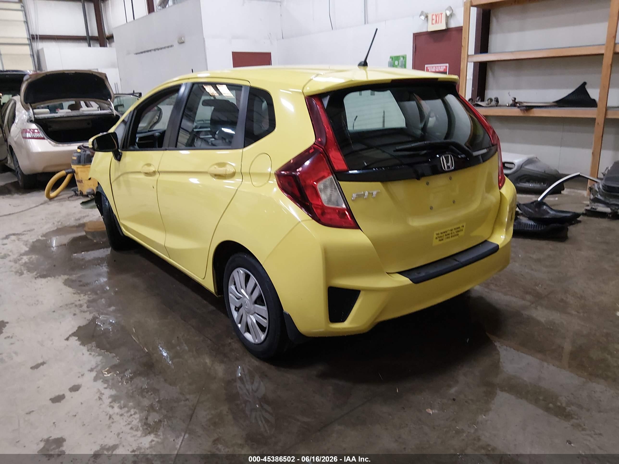 2015 Honda Fit Lx Yellow vin: 3HGGK5H57FM768989