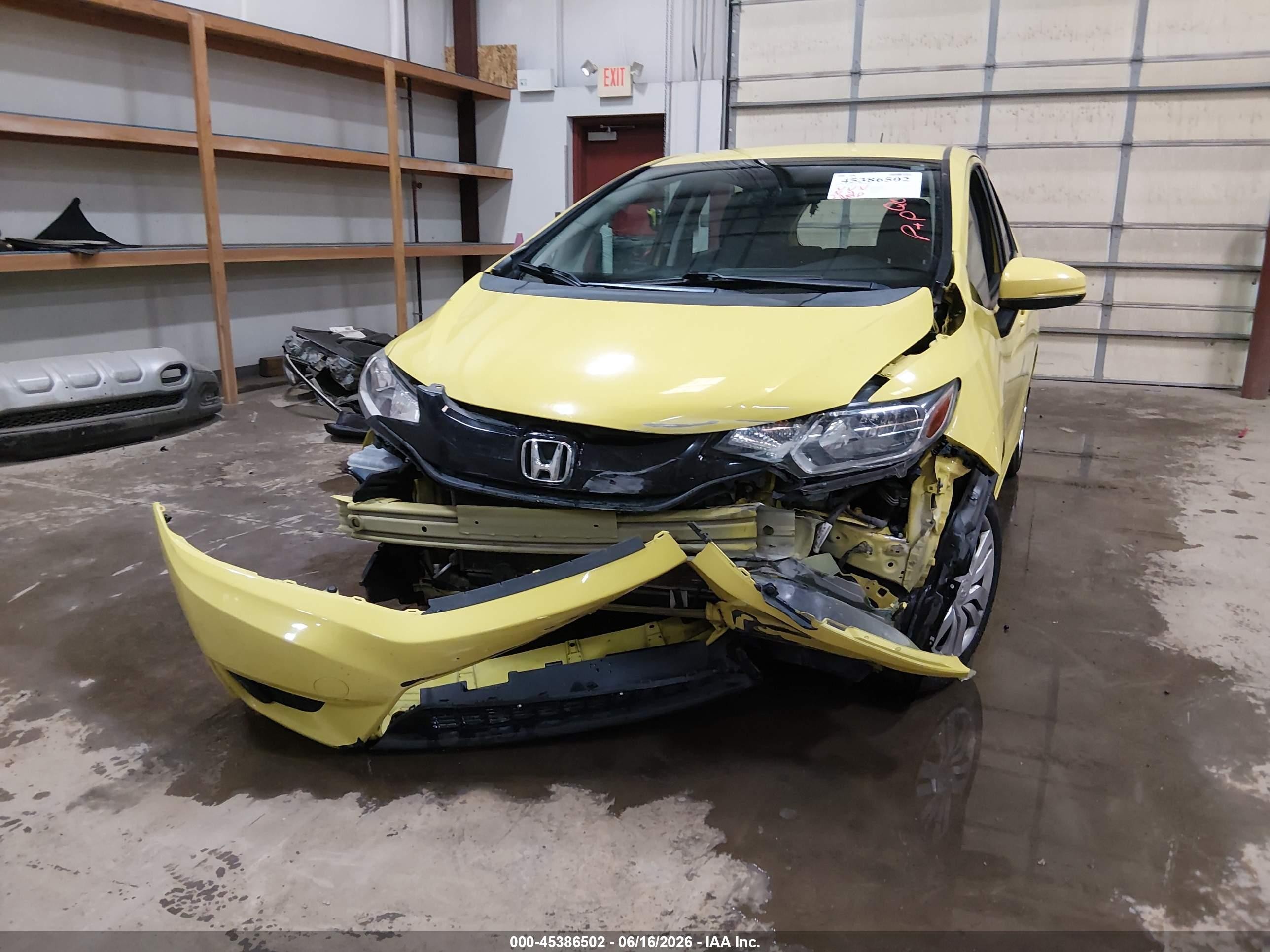 2015 Honda Fit Lx Yellow vin: 3HGGK5H57FM768989