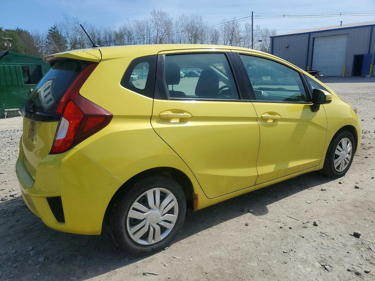 2015 Honda Fit Lx Yellow vin: 3HGGK5H59FM778262