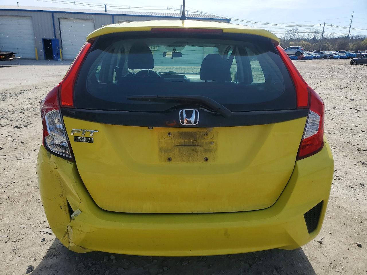 2015 Honda Fit Lx Yellow vin: 3HGGK5H59FM778262