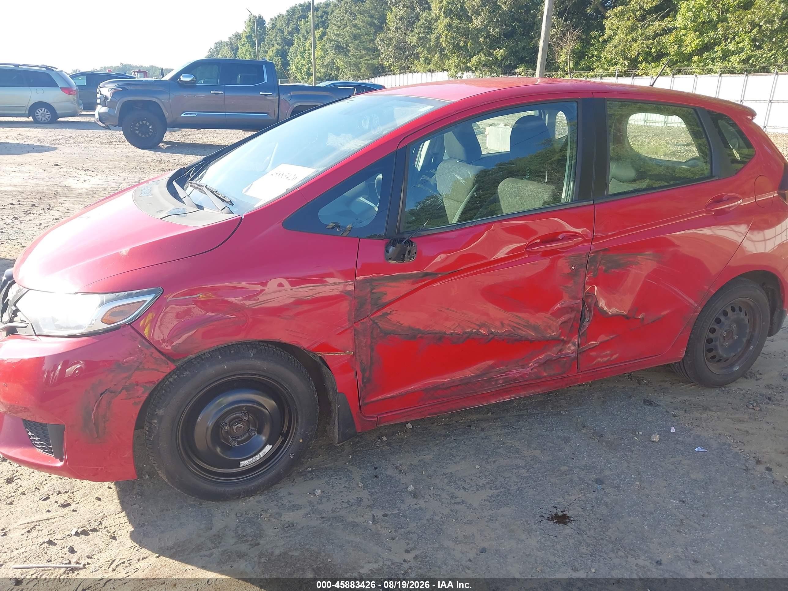 2015 Honda Fit Lx Red vin: 3HGGK5H59FM783915