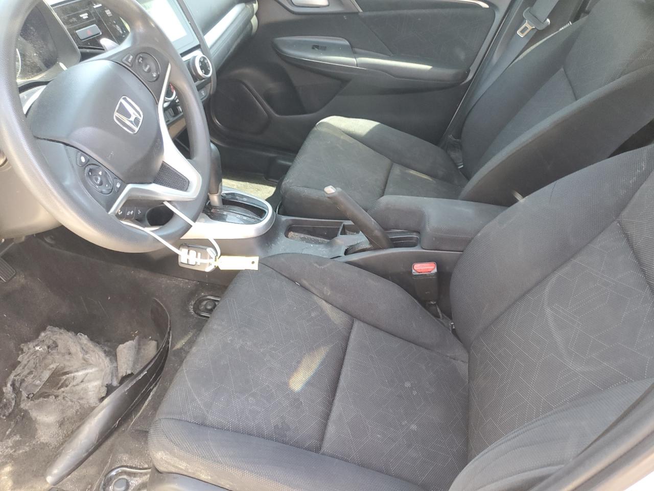 2015 Honda Fit Ex White vin: 3HGGK5H85FM723429 Damage: Left Front Carpet, Worn, Replacement Required