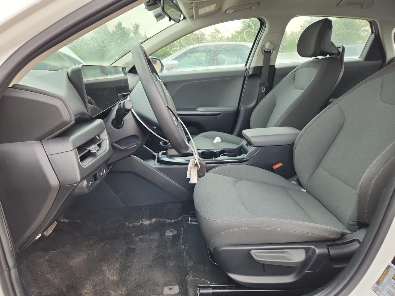 2025 Kia K4 Lxs White vin: 3KPFT4DE2SE085304 Damage: Left Front Carpet, Stained, Permanent