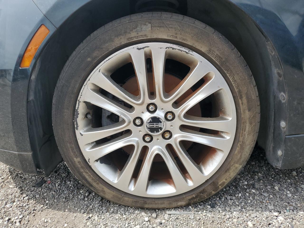 2014 Lincoln Mkz Black vin: 3LN6L2G99ER833204 Damage: Left Front Wheel, Curb Rash, > 12 Inches