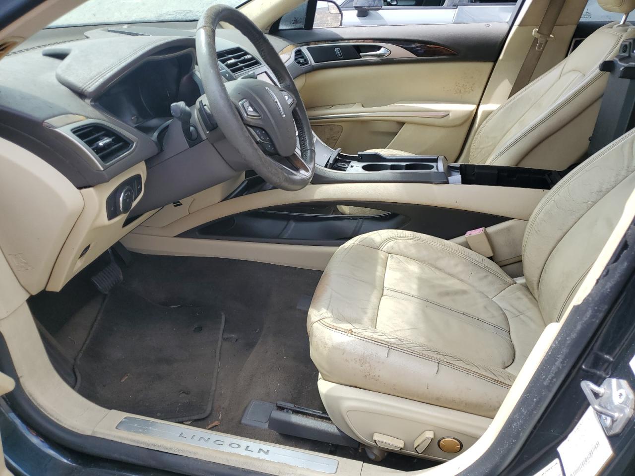 2014 Lincoln Mkz Black vin: 3LN6L2G99ER833204 Damage: Left Front Seat Cushion, Torn, 5 To 6 Inches