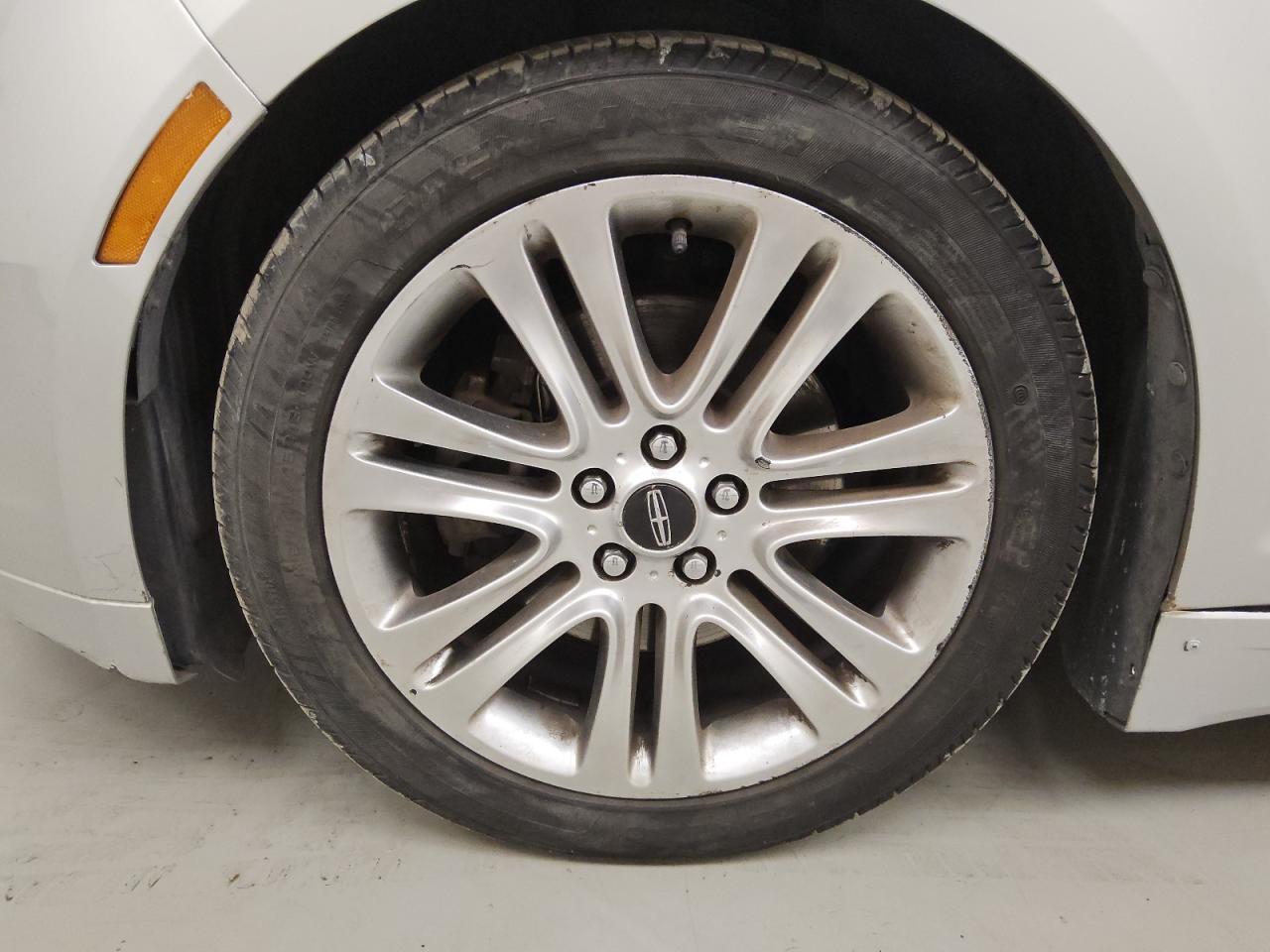 2013 Lincoln Mkz Silver vin: 3LN6L2GK4DR815209 Damage: Left Front Wheel, Curb Rash, > 12 Inches