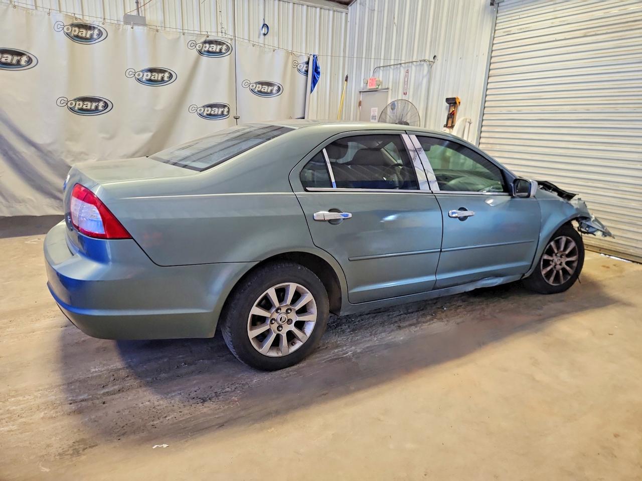 2006 Mercury Milan Turquoise vin: 3MEHM071X6R616575