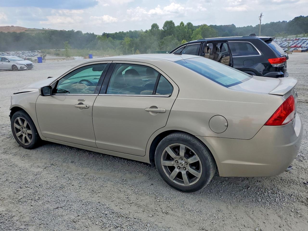 2010 Mercury Milan Premier Beige vin: 3MEHM0JG0AR628918