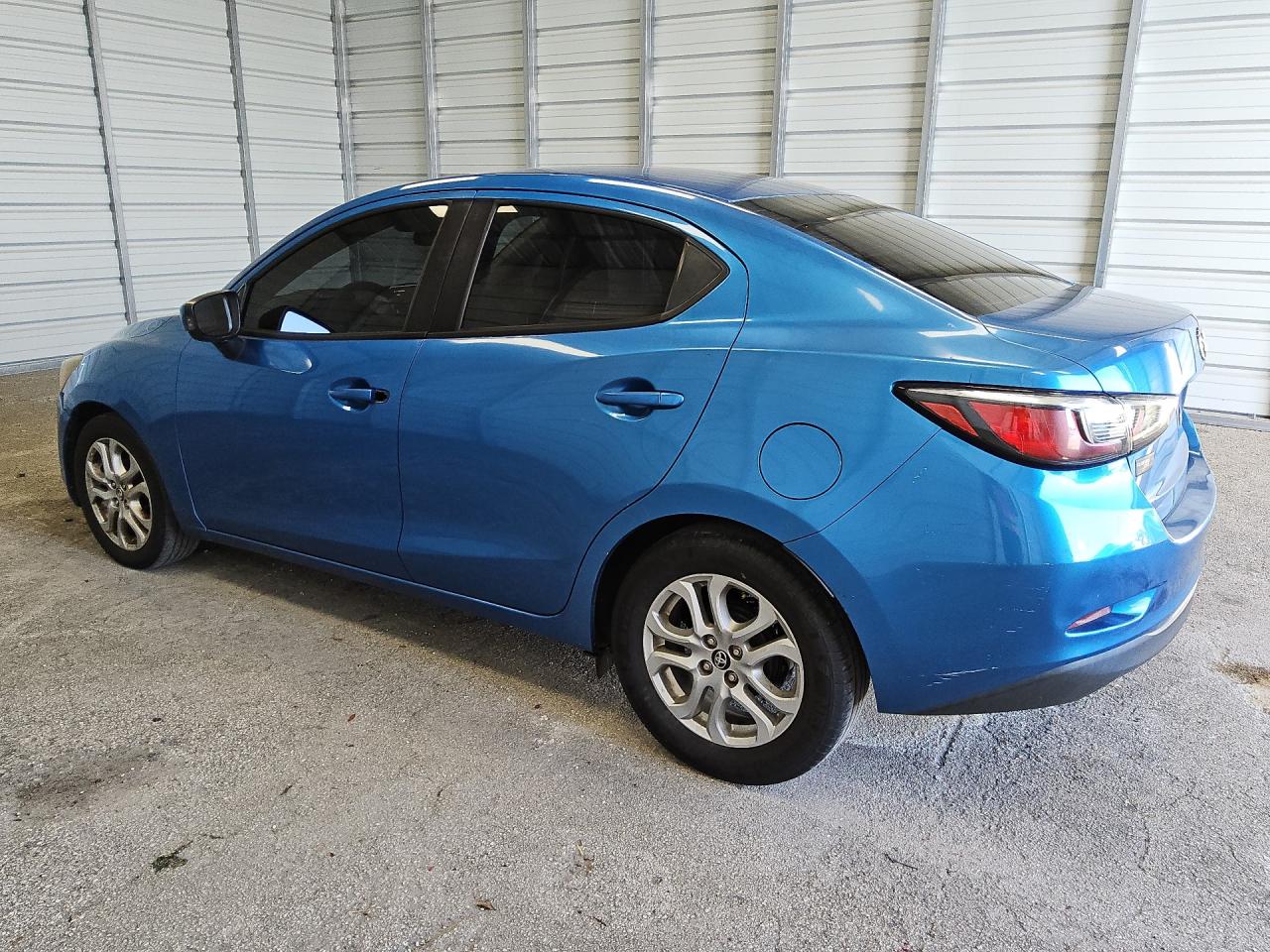 2017 Toyota Yaris Ia Base Blue vin: 3MYDLBYV0HY196254 Damage: Left Rear Door, Chipped, 2