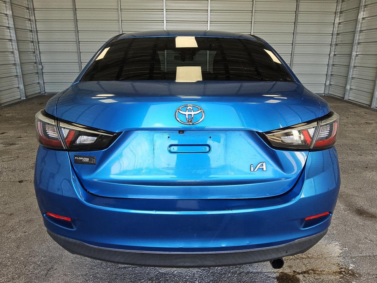 2017 Toyota Yaris Ia Base Blue vin: 3MYDLBYV0HY196254 Damage: Deck Lid, Chipped, 4