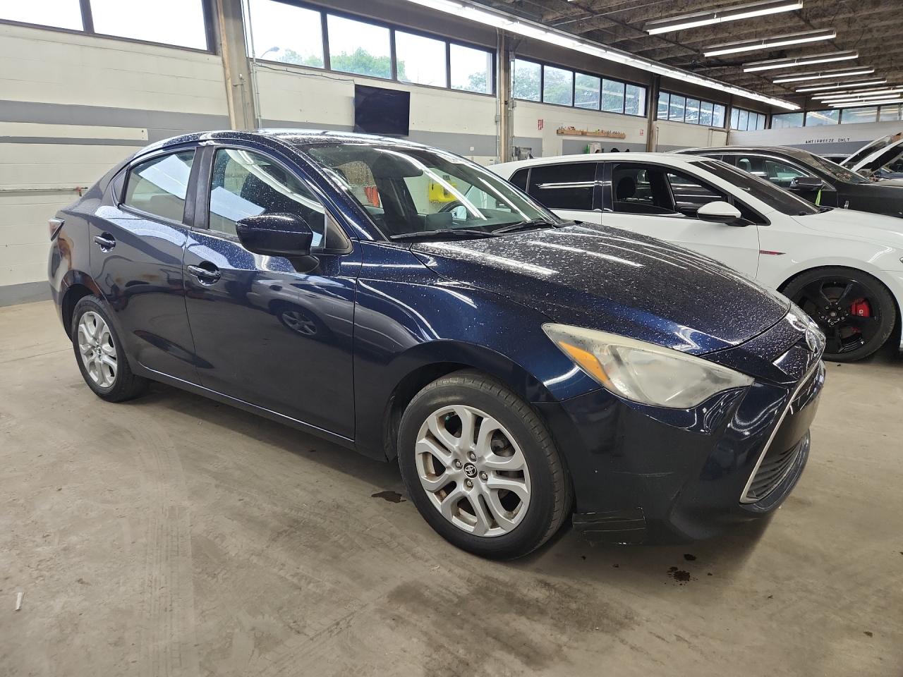 2018 Toyota Yaris Ia Base Синий vin: 3MYDLBYV3JY316392 Damage: Front Bumper/Cover, Broken, Replacement Required